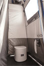 An internal look at a shower tent with a portable toilet inside