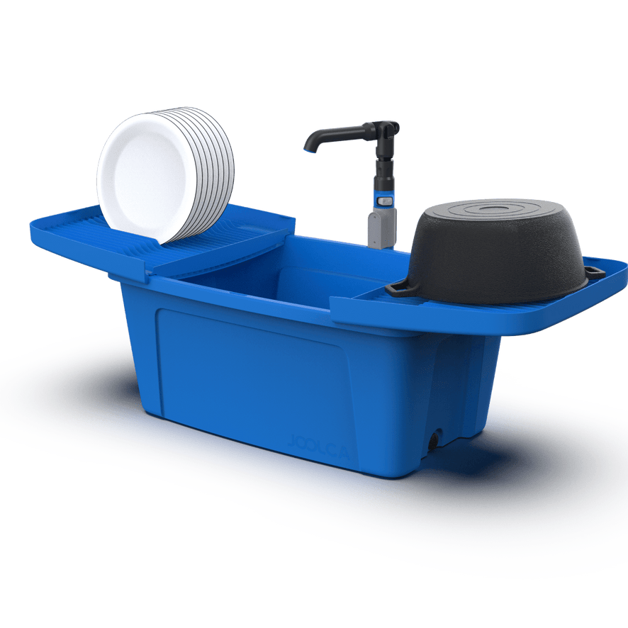 A portable kitchen sink showing the strength as it holds 6 plates and a large cast iron pot