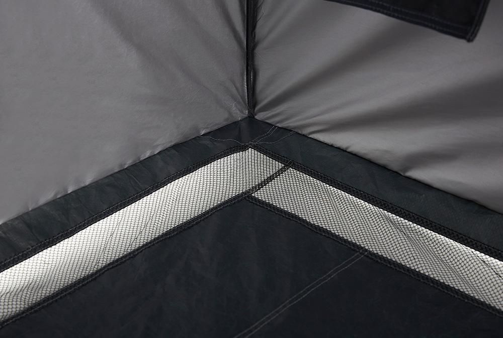Interior of the tent floor showing drainage areas