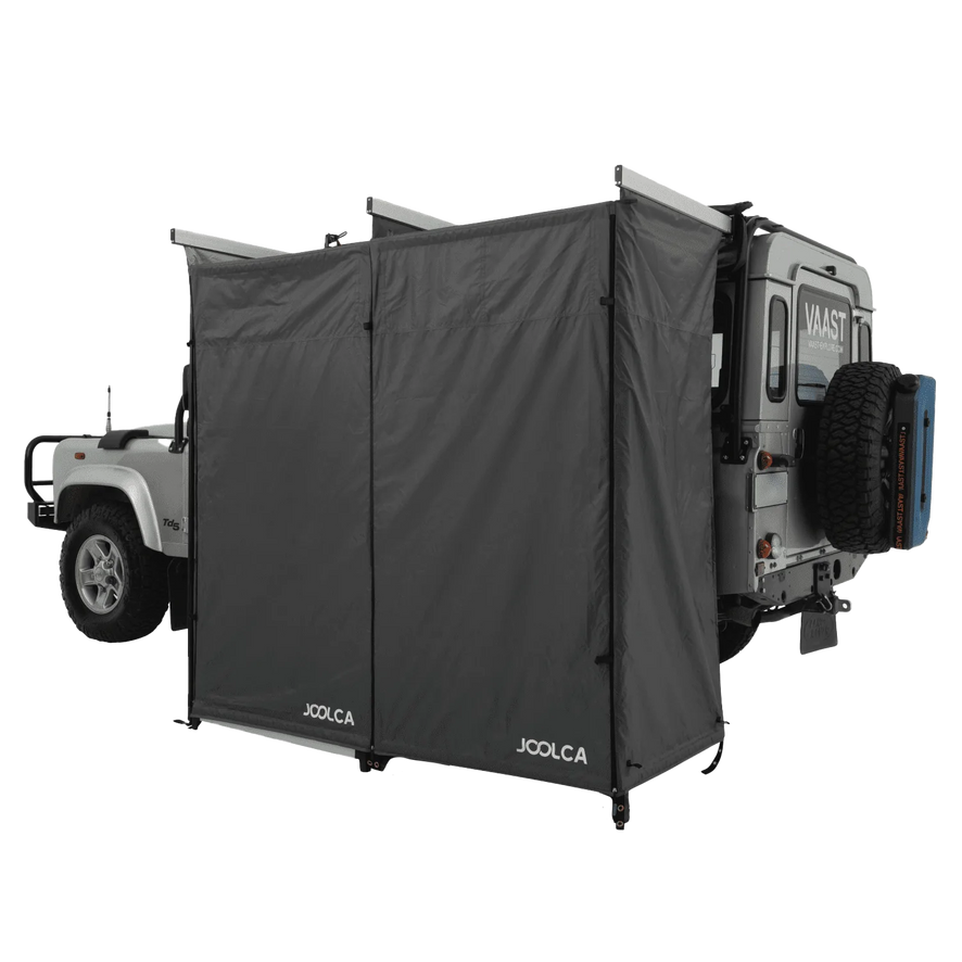 A double room mounted shower tent attached to a 4WD