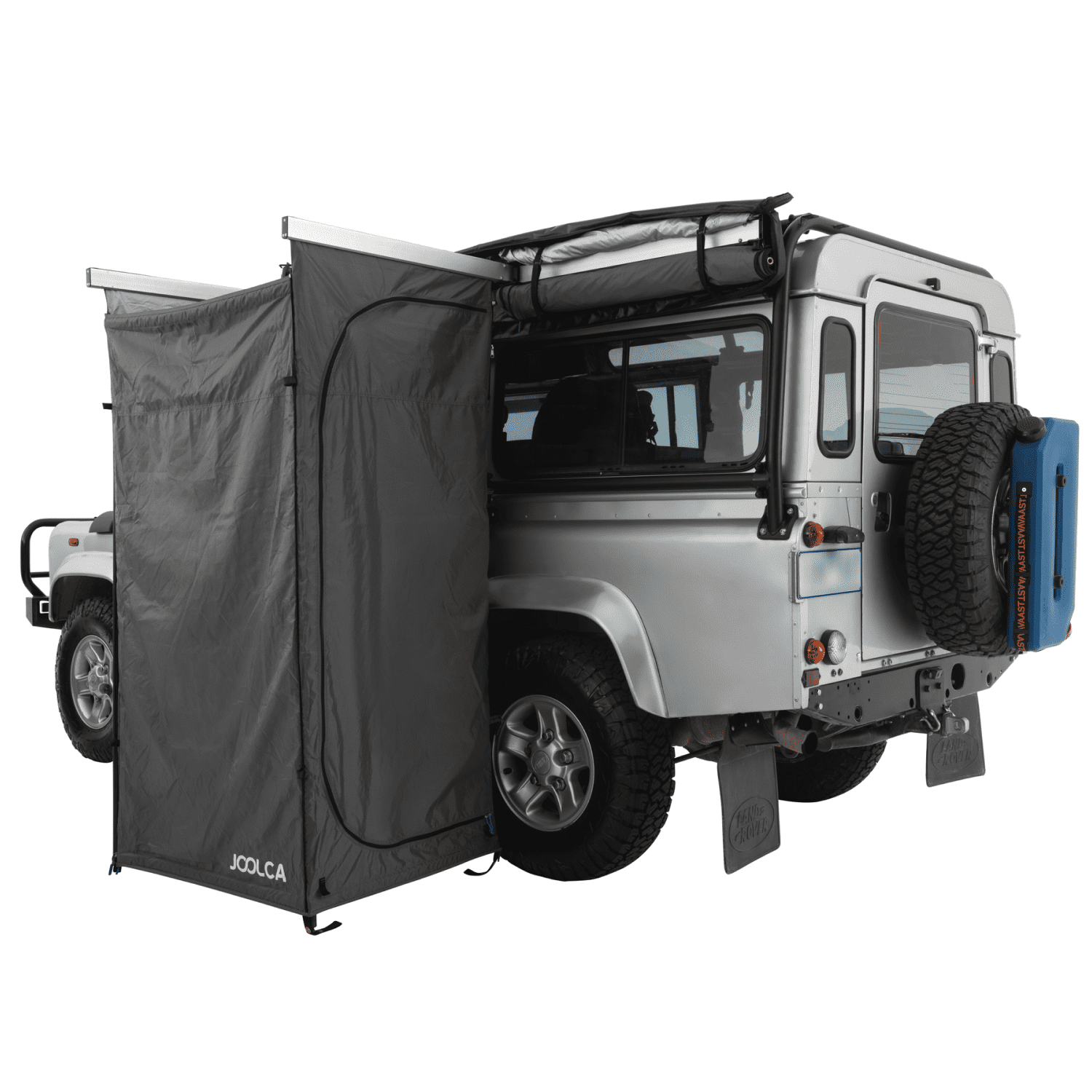 A side angle of a land rover 4WD with a mounted double Joolca branded shower tent attached