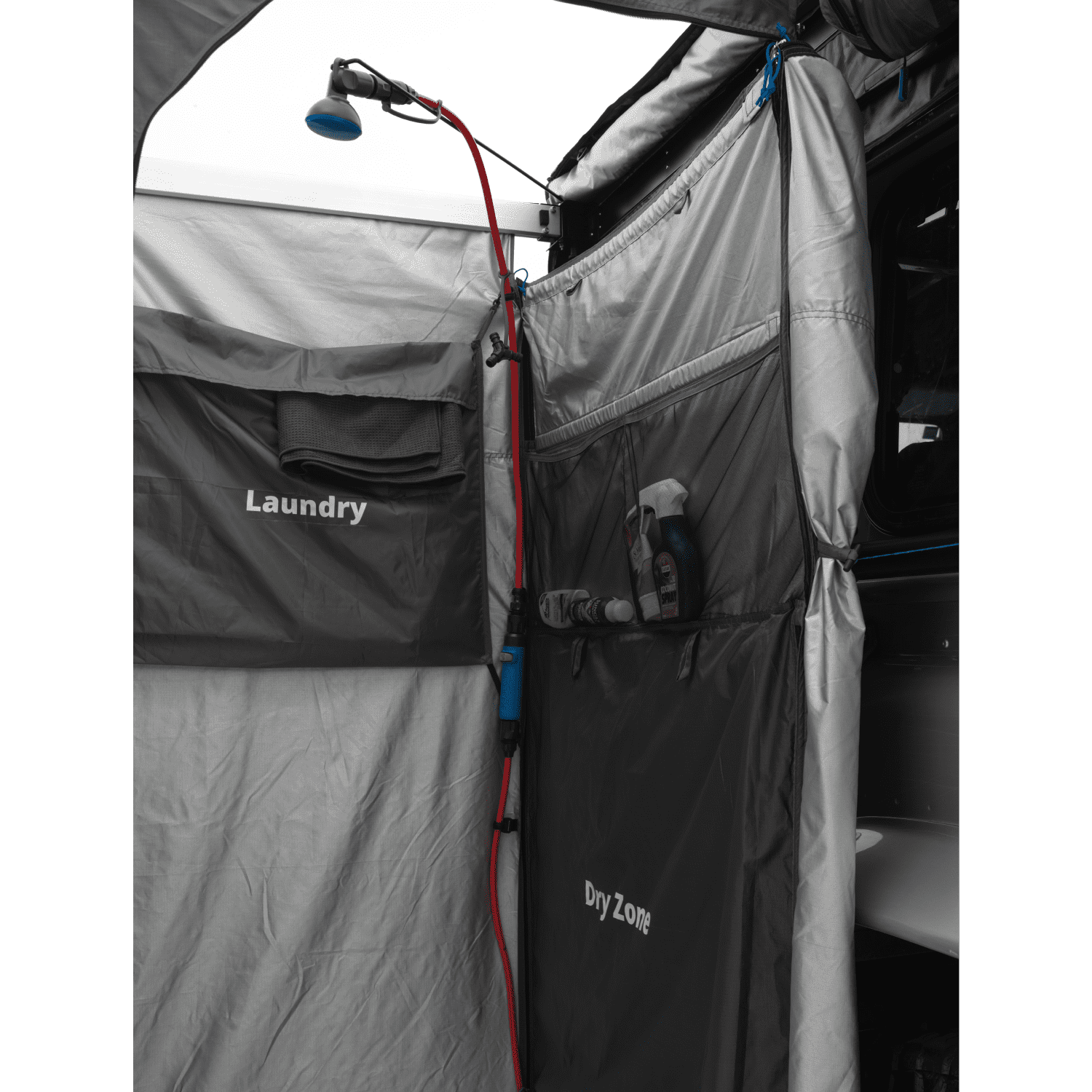 Internal view of a mounted shower tent, displaying the text 