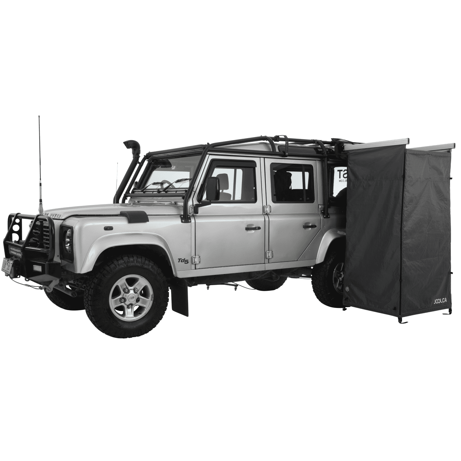 A side angle of a land rover 4WD with a mounted single Joolca branded shower tent attached 
