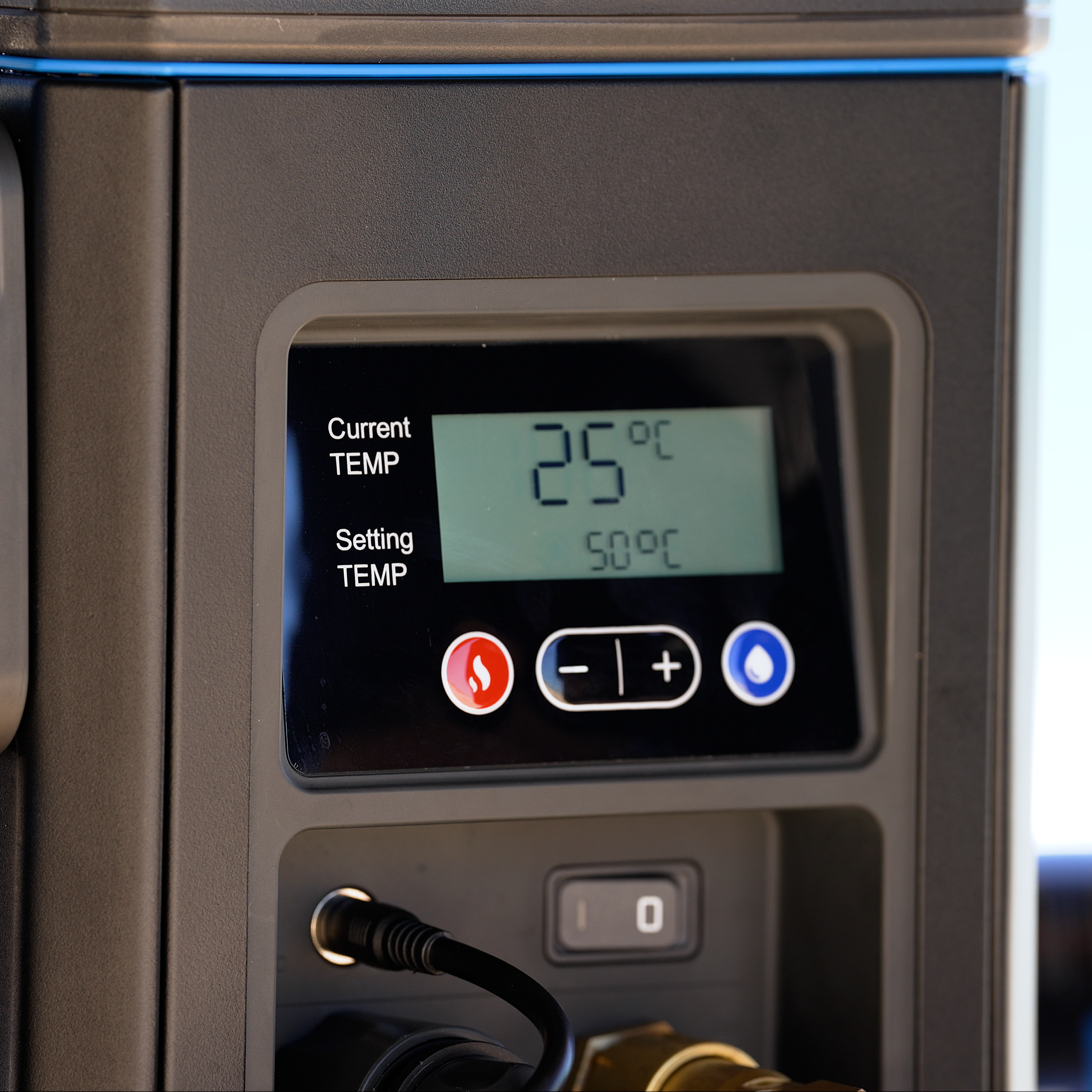 HOTTAP Go digital display showing current and set water temperature with flame and control buttons