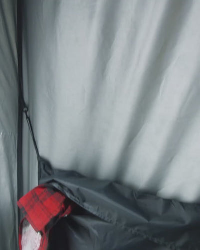 Close-up of the inside the Joolca Ensuite Double tent - showing towels and toiletries.