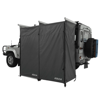 A double room mounted shower tent attached to a 4WD