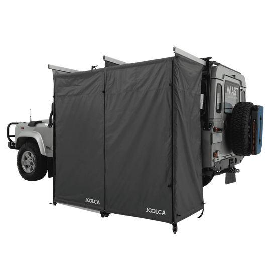 A double room mounted shower tent attached to a 4WD